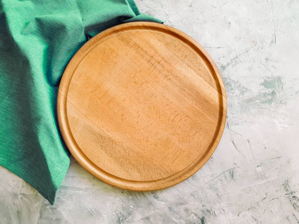 istock wooden kitchen board on concrete background 1263036889