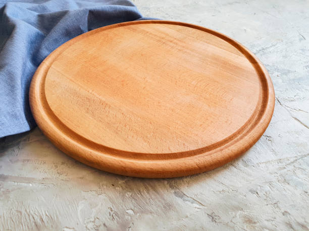 istock wooden kitchen board on concrete background 1263037001
