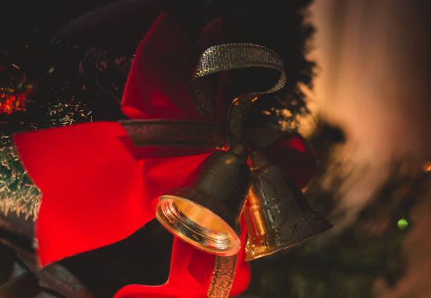 christmas bells hanging on the tree. holiday decor