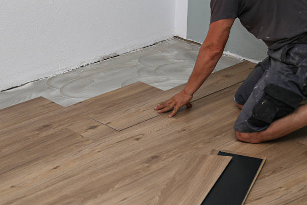 istock The worker installing new vinyl tile floor 1263037897