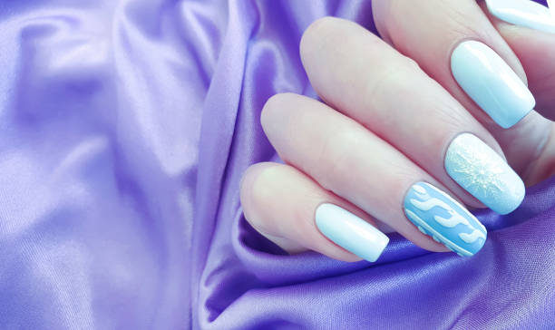 istock female hand manicure silk 1263038363