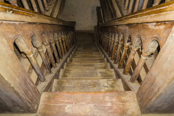 istock Old vintage wooden staircase going down 1263041809