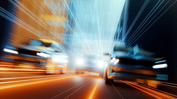 coches de exceso de velocidad genéricos en la ciudad futurista - driving night car headlight fotografías e imágenes de stock