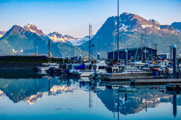 The Harbor Reflection Valdez, known as Alaska’s “little Switzerland”. prince william sound photos stock pictures, royalty-free photos & images