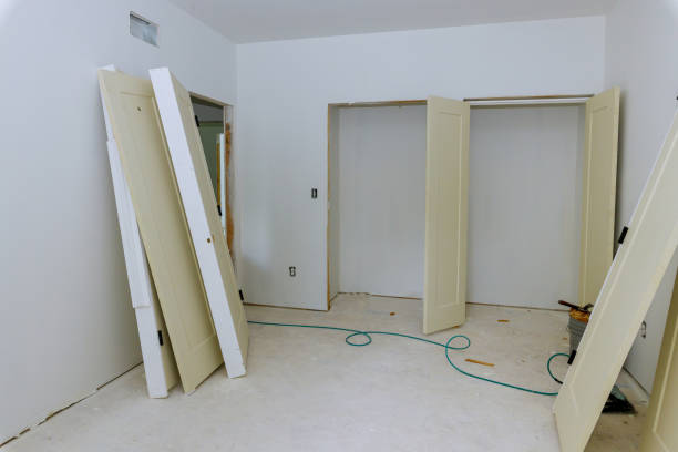 istock A interior wooden doors a wait installation for new apartment building 1263058688