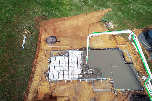 Drone view of concrete slab construction on building site