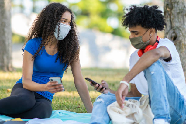 istock College students wearing masks on campus 1263065852
