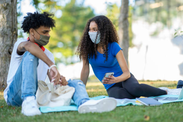 istock College students wearing masks on campus 1263065856