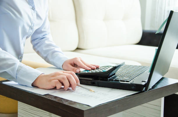 istock business woman working at home on the computer. online work 1263078094