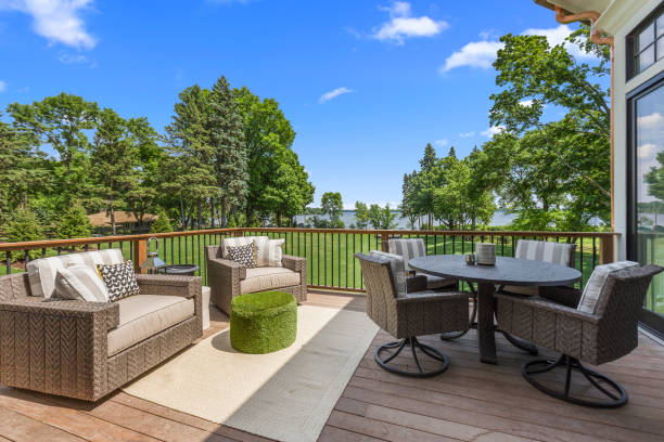 istock Lakeside luxury home with spacious deck and beautifully landscaped yard 1263079668
