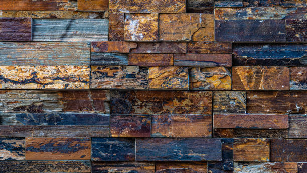 istock Bricks in different colors on a wall outdoors 1263083934