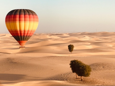 Hot Air Balloon over Desert Sands