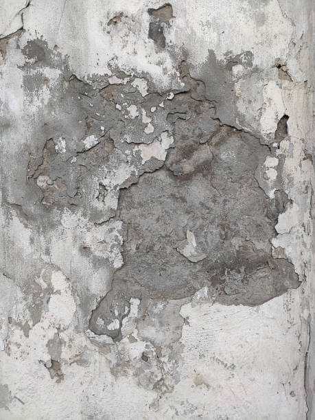 istock Grey Concrete Texture old wall with peeling paint, scratches and cracks 1263089121