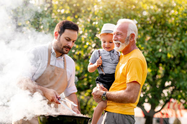 istock Family on vacation having barbecue party 1263089771