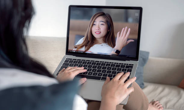 istock woman using laptop making video call to her partnership about plan in video conference. 1263098265