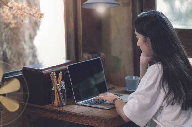 istock Young woman working with laptop at home, work from home concept. 1263100131