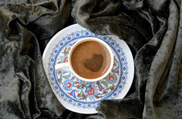 istock a cup of Turkish coffee on fabric background 1263101485