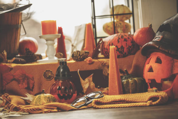 istock Low angle view of autumn and Halloween decorations by the window. 1263101649