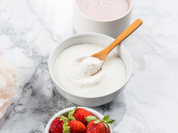 istock Collagen protein powder in bowl on marble 1263102035
