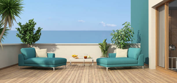 Beautiful terrace overlooking the sea beautiful terrace overlooking the sea with chaise lounges - 3d rendering
 Note: Terrace does not exist in reality, Property model is not necessary chaise longue photos stock pictures, royalty-free photos & images