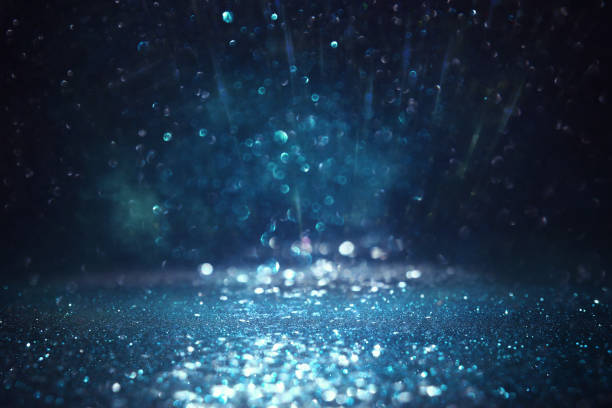 istock background of abstract glitter lights. silver, blue and black. de focused 1263104430