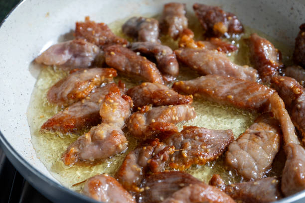 istock Dried Pork slices are frying 1263104482