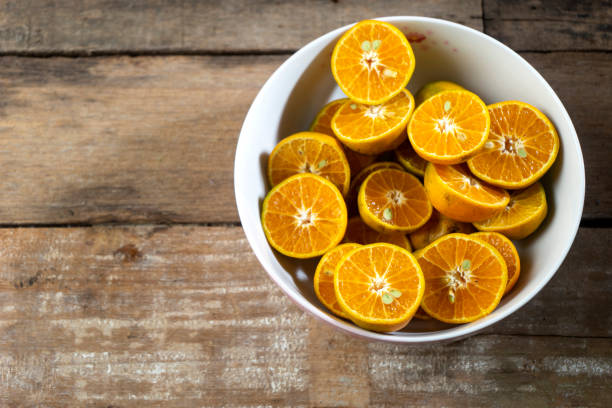 istock Group of oranges cut in half 1263104500