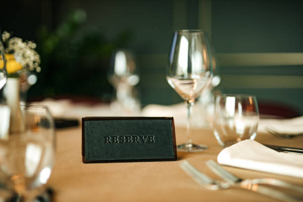istock Reserve sign on the table in restaurant. 1263104984
