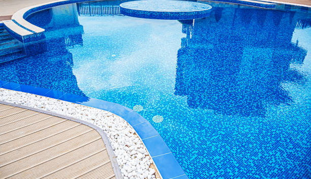 istock Beautiful swimming pool with blue tiles closeup. 1263105530