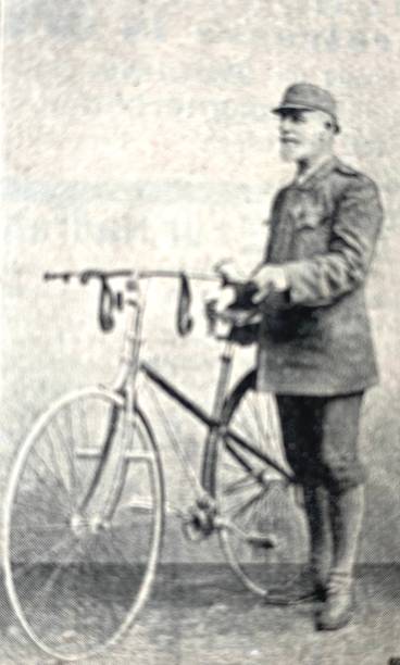 istock Senior man holding his bike 1263105823