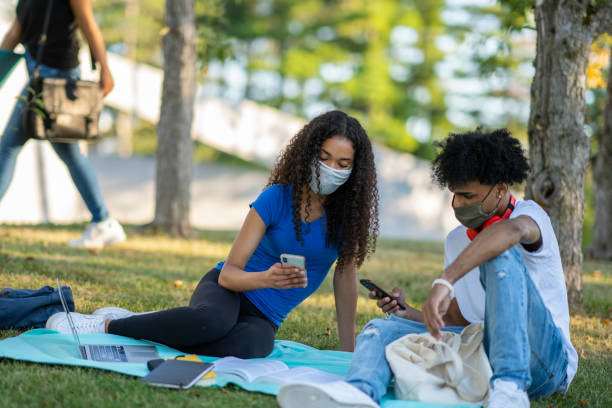 istock College students wearing masks on campus 1263108943