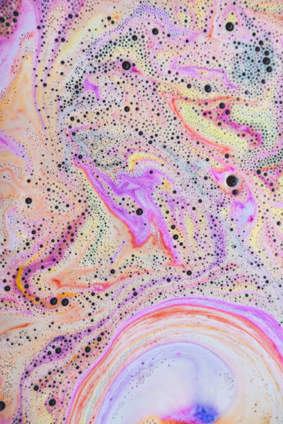 istock Colorful rainbow bath foam with bubbles in the water. Galaxy imagination. Marble texture effect. Beauty and luxury background 1263109917