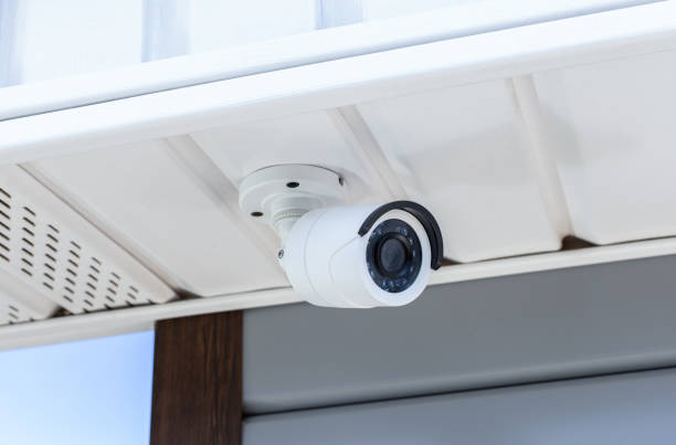 istock CCTV security camera for home security & surveillance, for privacy and protection against crime, mounted on house roof 1263116139