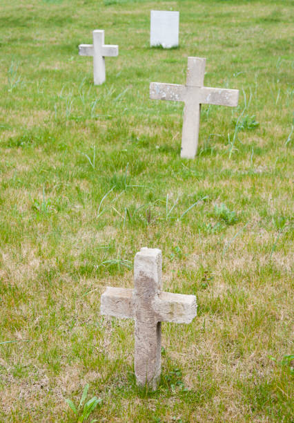 istock Several crosses on old nameless graves in an old cemetery 1263117957