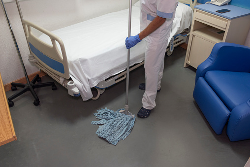 Cleaning staff cleaning hospital rooms