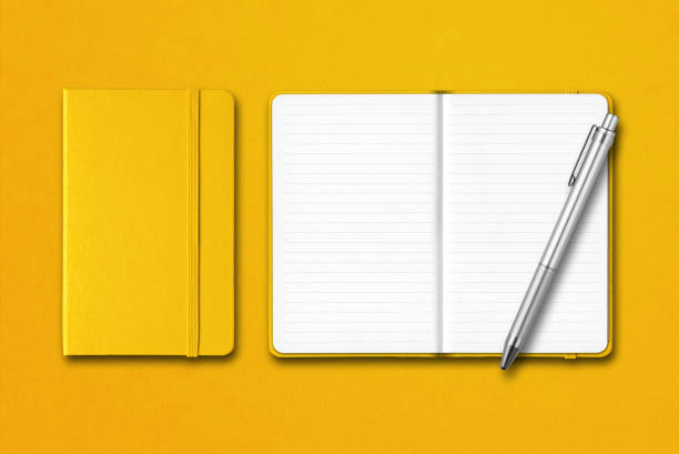 istock Yellow closed and open notebooks with a pen isolated on colorful background 1263121116