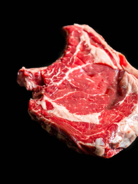 istock Beef prime rib isolated on black 1263121229