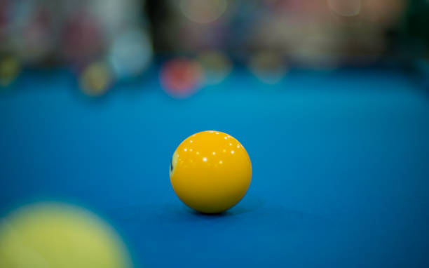 istock billiards yellow ball in focus 1263123350