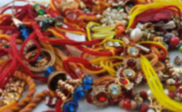 Blurred background of rakhee or holy threads pile
