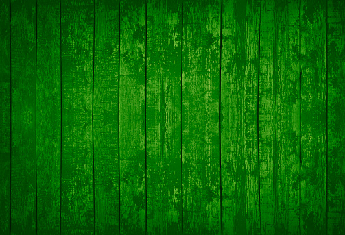 Green old wood background. Bright green wooden planks background. Toned texture of vintage painted boards.