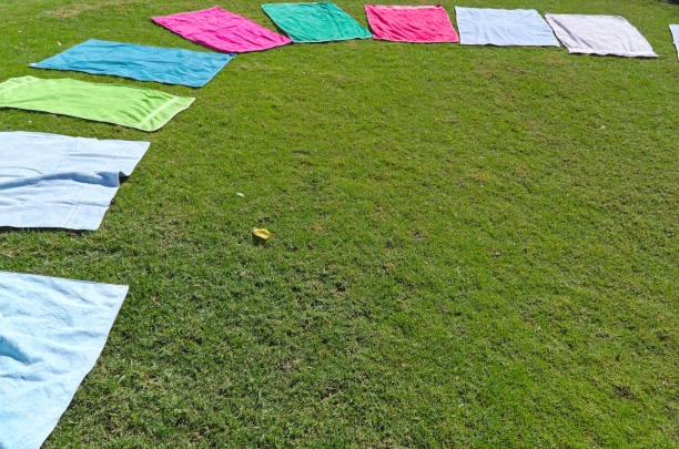 istock Towels on the grass for a Yoga class 1263126259