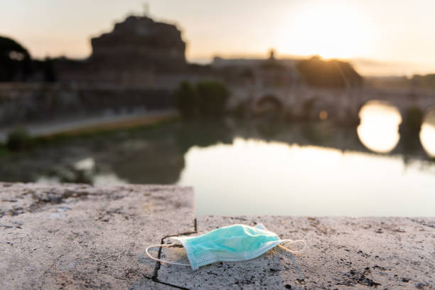 Protective mask on the background of most popular Italian attractions stock photo