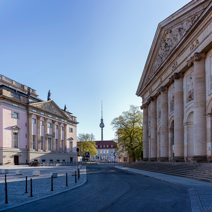 19.04.2020, Berlin, Germany. Bishop's Church of the Archdiocese of Berlin at Bebelplatz during the corona crisis. The Berlin television tower in the background.