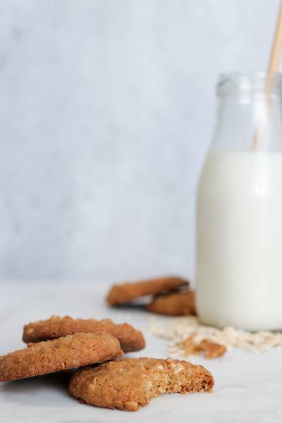 istock Anzac biscuits  and milk on light neutral background 1263127285