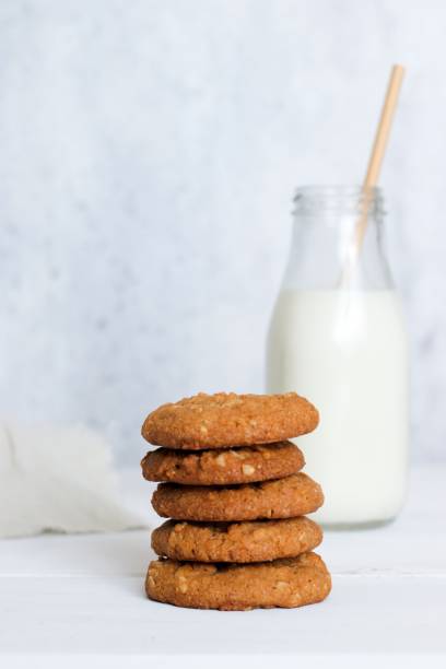 istock Anzac biscuits  and milk on light neutral background 1263127308