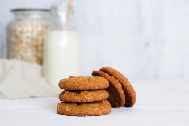 istock Anzac biscuits  and milk on light neutral background 1263127323