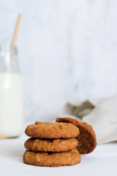 istock Anzac biscuits  and milk on light neutral background 1263127327