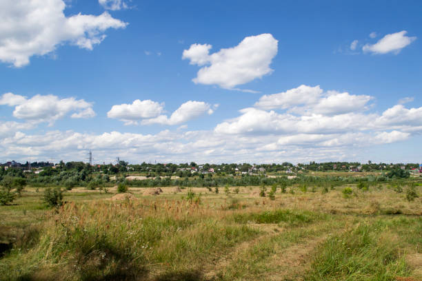 istock Countryside landscape with blue sky and white clouds. 1263132355