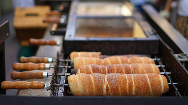istock Making Trdelnik with sugar and cinnamon, 1263136151