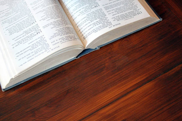istock bible open on wood background and copy space 1263140754